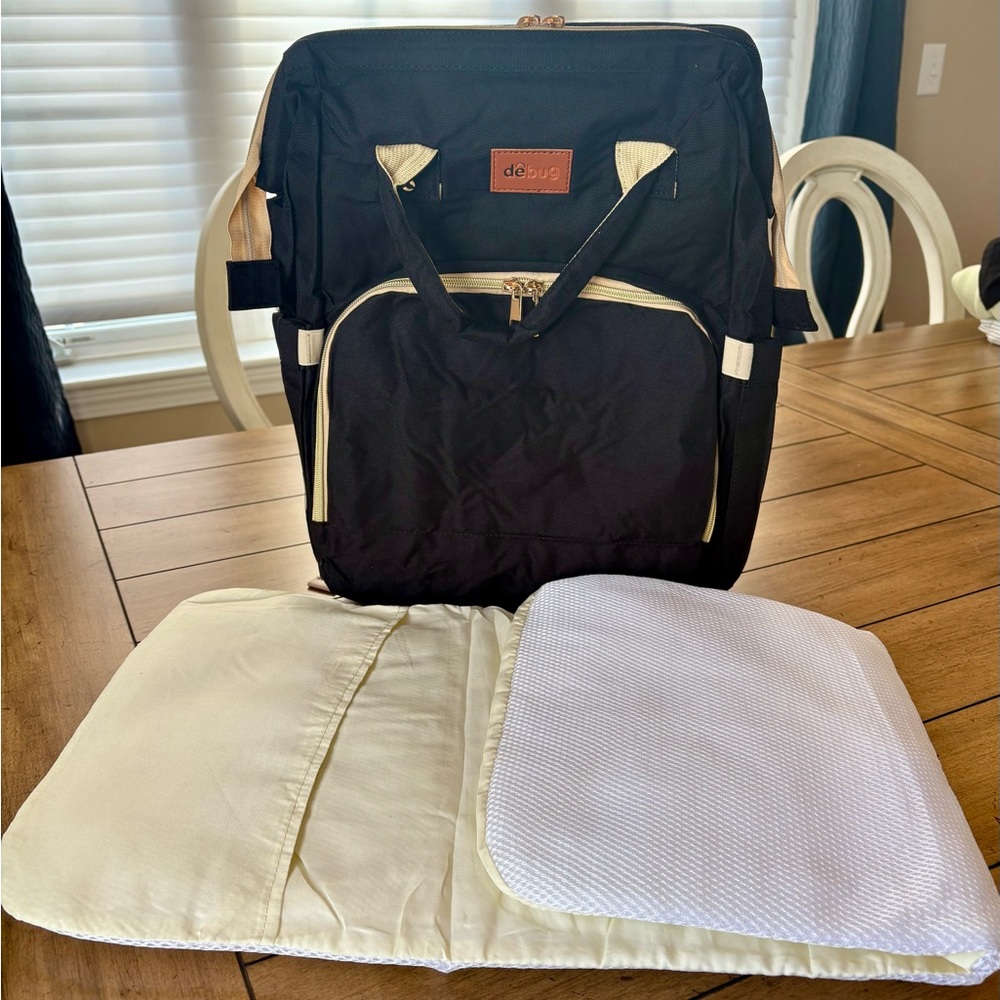 NWOT Debug Black Diaper Bag / Backpack with Changing Pad, & Station or Crib